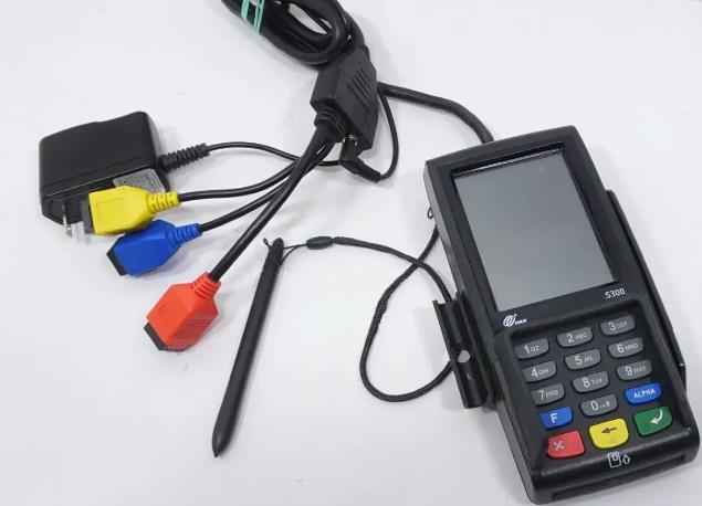 PAX S300 terminal with network cable connected to red interface