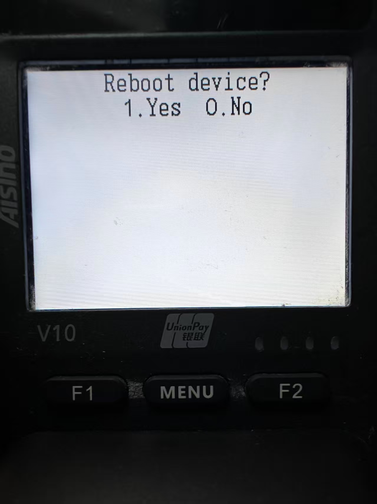 PAYMUSE V10 Reboot device confirmation screen showing 1.Yes 0.No
